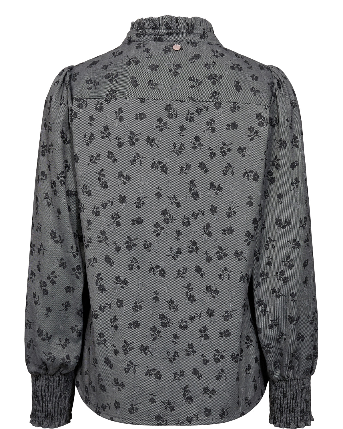 Floral patterned blouse on a white background