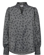 Gray floral-patterned blouse on a white background